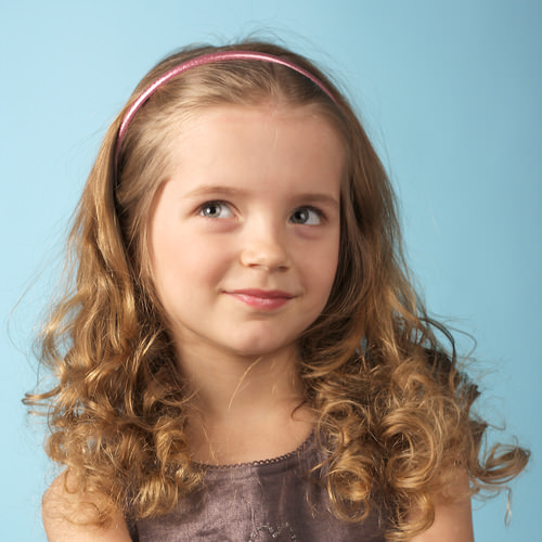 curly-cue-cute-style-for-a-little-girl-with-headband.jpg