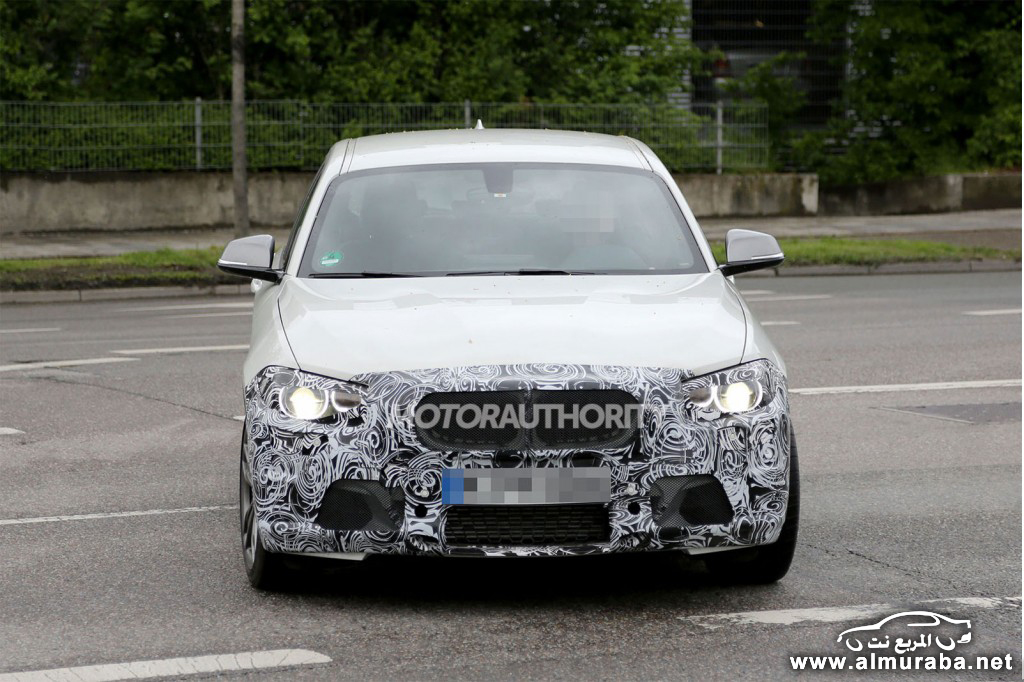 2014-bmw-1-series-hatchback-facelift-spy-shots_100429334_l.jpg