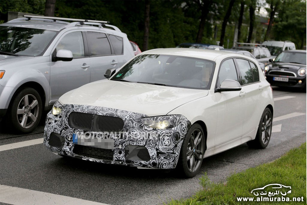 2014-bmw-1-series-hatchback-facelift-spy-shots_100429333_l.jpg