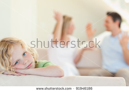 stock-photo-sad-boy-with-his-fighting-parents-in-the-background-91946186.jpg