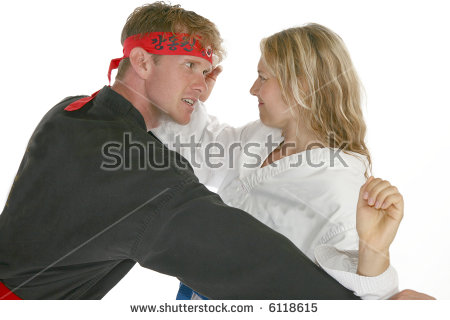 stock-photo-martial-arts-man-and-woman-fighting-6118615.jpg