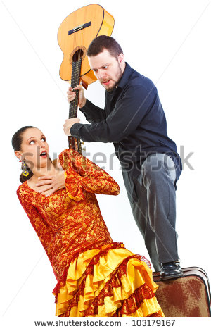 dancer-and-flamenco-guitarist-quarelling-man-holding-up-his-guitar-as-if-trying-to-hit-103179167.jpg