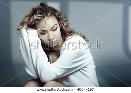 stock-photo-sad-latin-lady-indoors-before-shadows-40044157.jpg