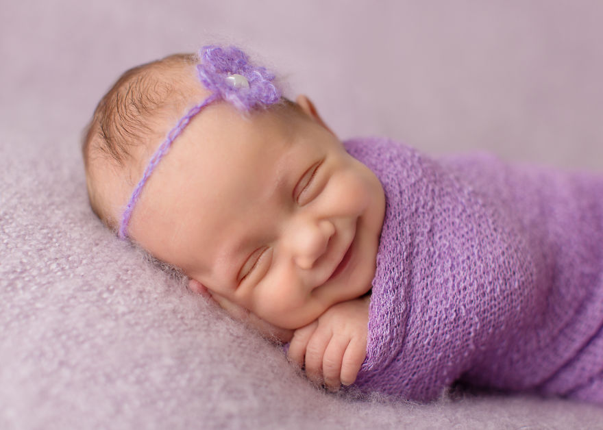 New-Born-Babie-in-purble.jpg