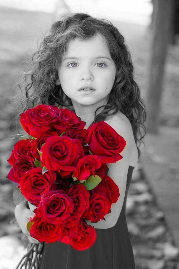 Cute-girl-with-red-damask-rose-bouquet-623x935.jpg